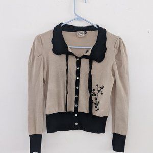 Banned Apparel Women's beige cardigan sweater with black floral design size M